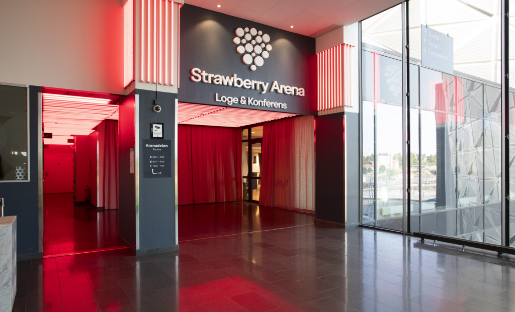 En digital och lysande skyltdesign på strawberry.